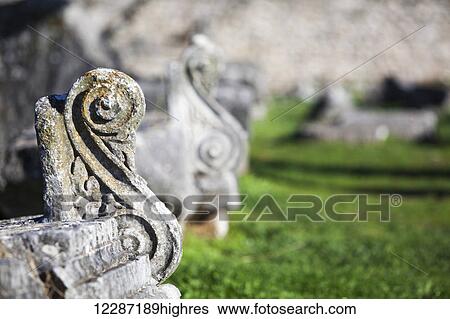 Close up of stone carving in scroll shape; Philippi, Greece View Large Photo Image Stock Photograph - Close up of stone carving in scroll shape; Philippi, Greece. Fotosearch