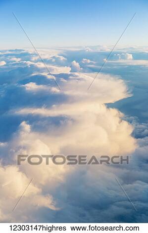 Cloud formations lit up by the setting sun over the North Atlantic; Anchorage, Alaska, United States of America View Large Photo Image Stock Photograph - Cloud formations lit up by the setting sun over the North Atlantic; Anchorage, Alaska, United States of America. Fotosearch