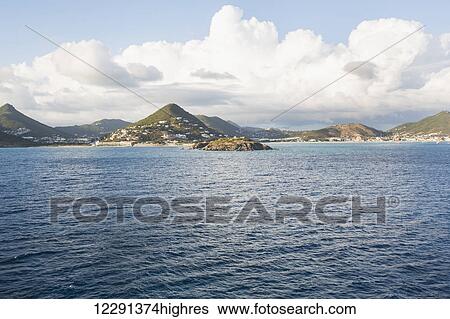 Coastline with peaked mountains; Philipsburg, Saint Martin View Large Photo Image Stock Photograph - Coastline with peaked mountains; Philipsburg, Saint Martin. Fotosearch