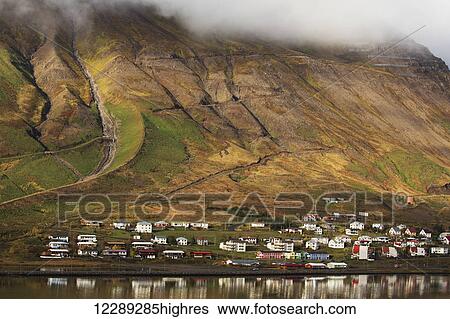 Colorful houses in a village along the coast; Siglufjordur, Iceland View Large Photo Image Stock Photograph - Colorful houses in a village along the coast; Siglufjordur, Iceland. Fotosearch