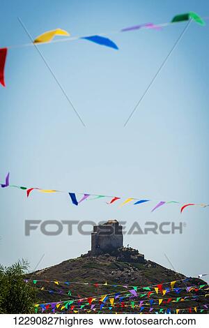 Colourful bunting and San Giovanni tower; Sardinia, Italy View Large Photo Image Stock Photograph - Colourful bunting and San Giovanni tower; Sardinia, Italy. Fotosearch