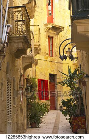 Stock Photograph - Colourful doors and shutters on residential buildings; Malta. Fotosearch