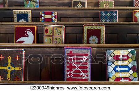 Colourful, patterned cushions along wooden benches in a church; Yorkshire Dales, England View Large Photo Image Stock Photograph - Colourful, patterned cushions along wooden benches in a church; Yorkshire Dales, England. Fotosearch