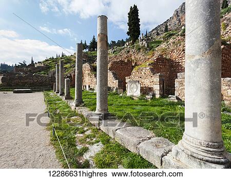 Stock Photograph - Columns at a site of ruins; Delphi, Greece. Fotosearch