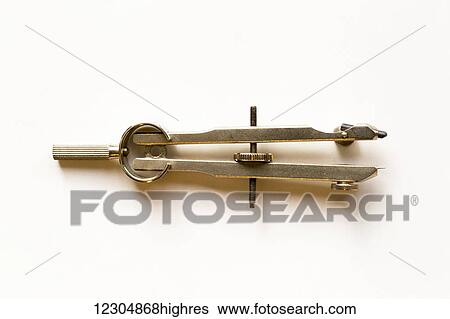 Stock Photograph - Compass, instrument used to inscribe circles; Chilliwack, British Columbia, Canada. Fotosearch