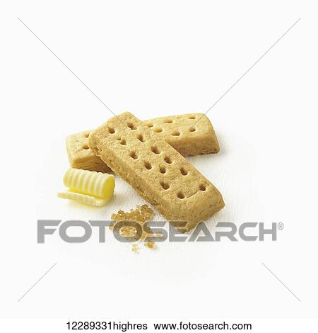 Cookies with curled butter and sugar crystals on a white background; Toronto, Ontario, Canada View Large Photo Image Stock Photograph - Cookies with curled butter and sugar crystals on a white background; Toronto, Ontario, Canada. Fotosearch