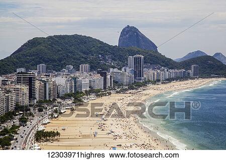 Copacabana from above looking towards Sugarloaf Mountain; Rio de Janeiro, Brazil View Large Photo Image Stock Photograph - Copacabana from above looking towards Sugarloaf Mountain; Rio de Janeiro, Brazil. Fotosearch