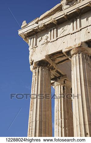 Stock Photograph - Corner of marble Parthenon colonnade and pediment; Athens, Attica, Greece. Fotosearch