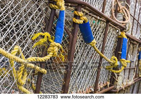 Crab pots stacked on shore, St. Paul Harbor, St. Paul Island, Southwestern Alaska, USA View Large Photo Image Stock Image - Crab pots stacked on shore, St. Paul Harbor, St. Paul Island, Southwestern Alaska, USA. Fotosearch