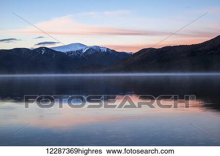 Stock Photograph - Dawn over Fish Lake; Yukon, Canada. Fotosearch