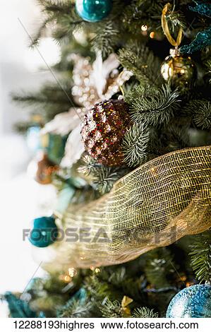 Stock Photograph - Decorations on a Christmas tree; Priddis, Alberta, Canada. Fotosearch