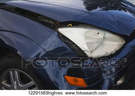 Dented front end of an automobile after an accident; Roxton Pond, Quebec, Canada View Large Photo Image Stock Photograph - Dented front end of an automobile after an accident; Roxton Pond, Quebec, Canada. Fotosearch