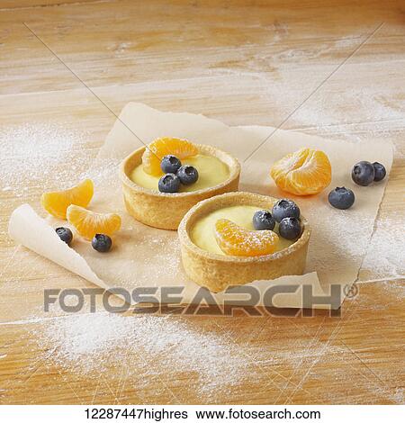 Dessert of custard, oranges and blueberries; Toronto, Ontario, Canada View Large Photo Image Stock Photograph - Dessert of custard, oranges and blueberries; Toronto, Ontario, Canada. Fotosearch