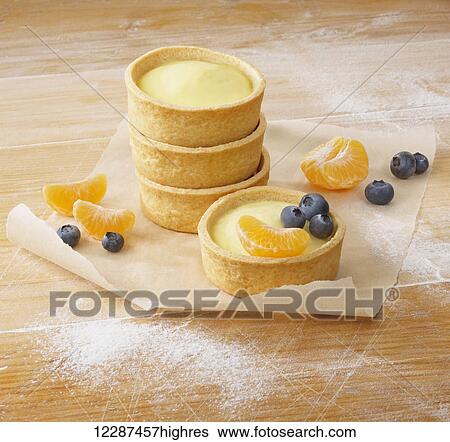 Dessert with custard, orange and blueberries; Toronto, Ontario, Canada View Large Photo Image Stock Photograph - Dessert with custard, orange and blueberries; Toronto, Ontario, Canada. Fotosearch