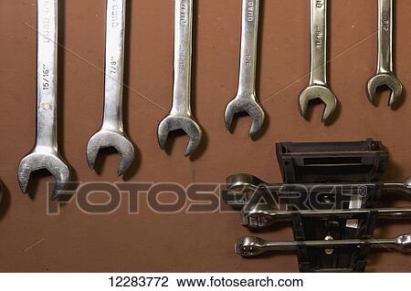 Detail of a set of wrenches hanging on a brown wall in a power plant, St. Paul Island, Southwestern Alaska, USA, Summer View Large Photo Image Stock Image - Detail of a set of wrenches hanging on a brown wall in a power plant, St. Paul Island, Southwestern Alaska, USA, Summer. Fotosearch