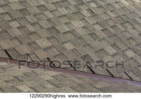 Detail of brand new roof shingles; Calgary, Alberta, Canada View Large Photo Image Stock Photograph - Detail of brand new roof shingles; Calgary, Alberta, Canada. Fotosearch