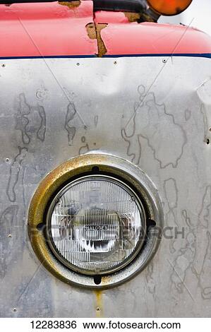 Detail of the headlight of a old rusted car, Sand Point, Southwestern Alaska, USA, Summer View Large Photo Image Stock Photograph - Detail of the headlight of a old rusted car, Sand Point, Southwestern Alaska, USA, Summer. Fotosearch
