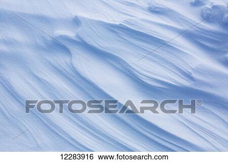 Stock Photograph - Detail view of hard packed windblown snow, Barrow, North Slope, Arctic Alaska, USA, Winter. Fotosearch