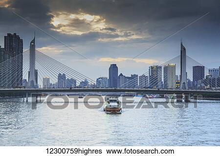 Dinner cruise along Pearl River enjoying Guangzhou skyline; Guangzhou, China View Large Photo Image Stock Photograph - Dinner cruise along Pearl River enjoying Guangzhou skyline; Guangzhou, China. Fotosearch