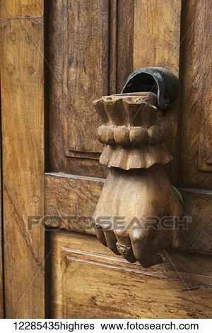 Door handle designed as a hanging human hand; San Miguel de Allende, Guanajuato, Mexico View Large Photo Image Stock Photograph - Door handle designed as a hanging human hand; San Miguel de Allende, Guanajuato, Mexico. Fotosearch