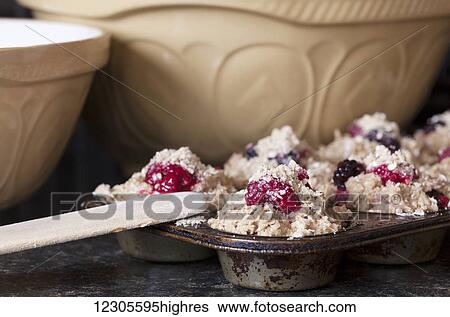 Stock Photograph - Dough for raspberry muffins; Vancouver Island, British Columbia, Canada. Fotosearch