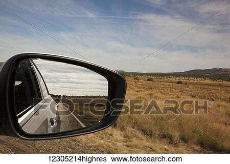 Driving route 66 with landscape reflected in car mirror; Arizona, United States of America View Large Photo Image Stock Photograph - Driving route 66 with landscape reflected in car mirror; Arizona, United States of America. Fotosearch