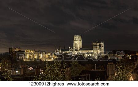 Stock Photograph - Durham Cathedral and Castle illuminated at night; Durham, England. Fotosearch