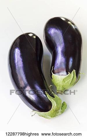 Stock Photograph - Eggplants on a white background; Chilliwack, British Columbia, Canada. Fotosearch