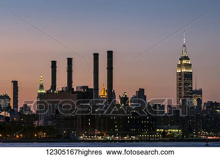 Empire State Building at sunset; New York City, New York, United States of America View Large Photo Image Stock Photograph - Empire State Building at sunset; New York City, New York, United States of America. Fotosearch