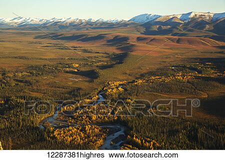 Engineer Creek runs through the landscape along the Dempster Highway as seen from the top of Sapper Hill; Yukon, Canada View Large Photo Image Stock Photograph - Engineer Creek runs through the landscape along the Dempster Highway as seen from the top of Sapper Hill; Yukon, Canada. Fotosearch