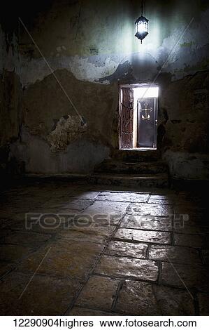 Stock Photograph - Entrance from the Church of the Nativity to the Armenian monastery that is on the South side of the church; Bethlehem, Israel. Fotosearch