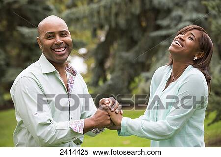 Stock Photography - Father and daughter spending quality time together in a park; Edmonton, Alberta, Canada. Fotosearch
