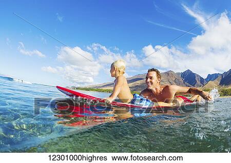 Father and Son Surfing Together View Large Photo Image Stock Photograph - Father and Son Surfing Together. Fotosearch