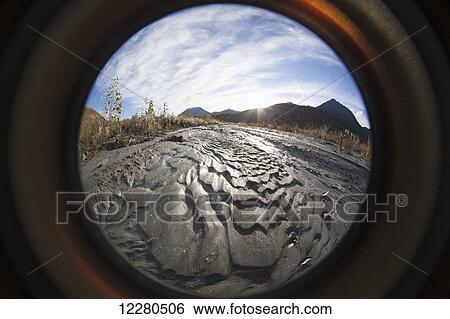 Fish eye view of mud ripple deposits along a side channel of the Matanuska River near King Mountain, Southcentral Alaska View Large Photo Image Stock Photograph - Fish eye view of mud ripple deposits along a side channel of the Matanuska River near King Mountain, Southcentral Alaska. Fotosearch