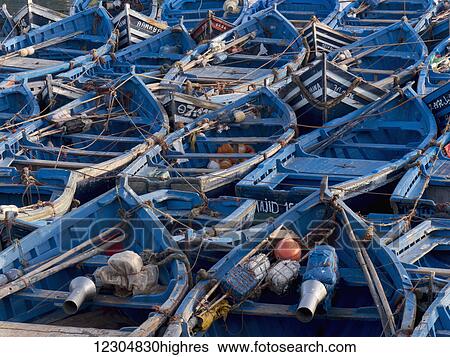 Fishing boats in the fishing port; Essaouira, Morocco View Large Photo Image Stock Photograph - Fishing boats in the fishing port; Essaouira, Morocco. Fotosearch
