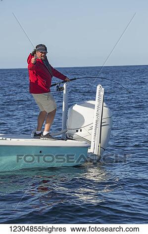 Fishing from a boat on the Atlantic ocean; Cape Cod, Massachusetts, United States of America View Large Photo Image Stock Photograph - Fishing from a boat on the Atlantic ocean; Cape Cod, Massachusetts, United States of America. Fotosearch