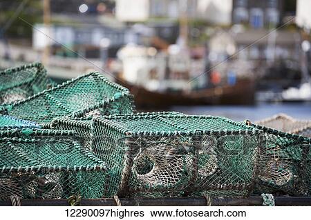 Stock Photograph - Fishing traps in the harbor; Whitby, Yorkshire, England. Fotosearch