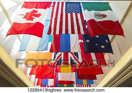 Stock Photograph - Flags from various countries hanging, Southern Methodist University; Dallas, Texas, United States of America. Fotosearch