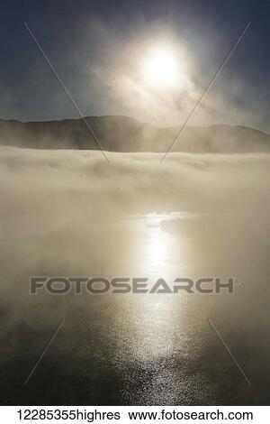 Fog at sunrise over the Yukon river near Whitehorse, Yukon Territory, Canada View Large Photo Image Stock Photograph - Fog at sunrise over the Yukon river near Whitehorse, Yukon Territory, Canada. Fotosearch