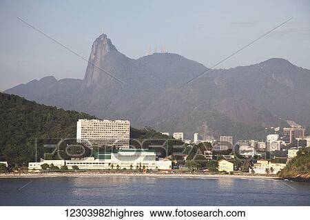 Stock Photograph - Fora Beach, Christ the Redeemer statue; Rio de Janeiro, Brazil. Fotosearch