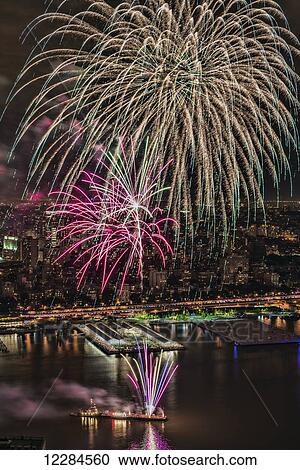 Fourth of July Macy's fireworks over the East River; New York City, New York, United States of America View Large Photo Image Stock Image - Fourth of July Macy's fireworks over the East River; New York City, New York, United States of America. Fotosearch