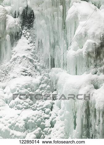 Picture - Frozen waterfall in Johnston Canyon, Banff National Park; Alberta, Canada. Fotosearch