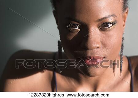 Glamorous portrait of a young woman; Toronto, Ontario, Canada View Large Photo Image Stock Photograph - Glamorous portrait of a young woman; Toronto, Ontario, Canada. Fotosearch