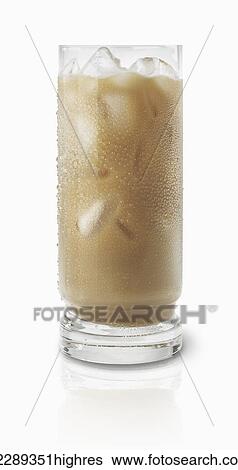 Glass of a light brown coloured beverage with ice cubes on a white background; Toronto, Ontario, Canada View Large Photo Image Stock Photograph - Glass of a light brown coloured beverage with ice cubes on a white background; Toronto, Ontario, Canada. Fotosearch