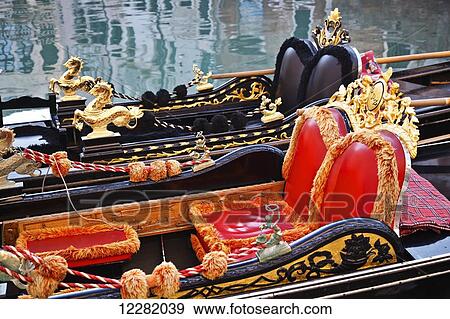 Gondolas in a canal; Venice, Italy View Large Photo Image Stock Photo - Gondolas in a canal; Venice, Italy. Fotosearch