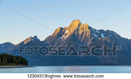 Grand Teton range and Lake Jackson, Grand Teton National Park; Wyoming, United States of America View Large Photo Image Stock Photograph - Grand Teton range and Lake Jackson, Grand Teton National Park; Wyoming, United States of America. Fotosearch