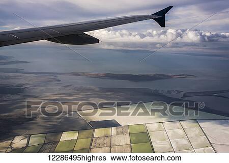Great Salt Lake viewed from a commercial flight; Salt Lake City, Utah, United States of America View Large Photo Image Stock Photograph - Great Salt Lake viewed from a commercial flight; Salt Lake City, Utah, United States of America. Fotosearch