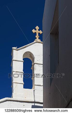 Greek church with golden cross detail and deep blue sky; Mykonos, Greece View Large Photo Image Stock Photograph - Greek church with golden cross detail and deep blue sky; Mykonos, Greece. Fotosearch