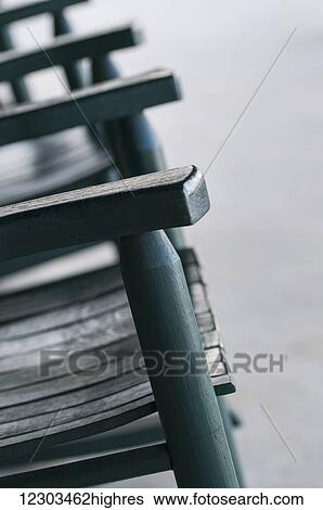 Green rocking chairs View Large Photo Image Stock Photograph - Green rocking chairs. Fotosearch
