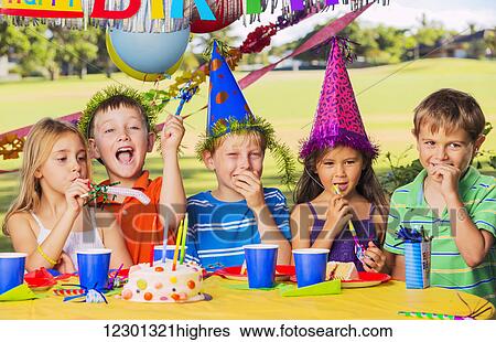 Group of adorable kids at birthday party View Large Photo Image Stock Photograph - Group of adorable kids at birthday party. Fotosearch